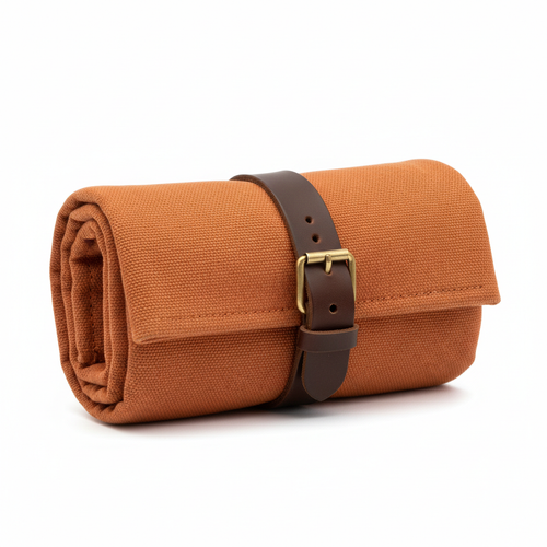 Opus Adventure Toiletry Roll Burnt Orange - closed rolled view